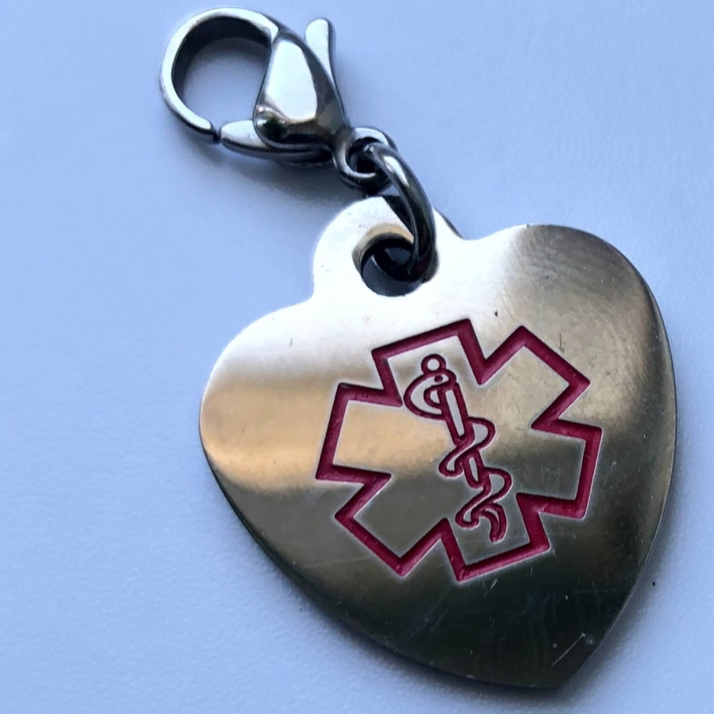 buyamedicalalert.com Stainless Steel Medical Alert Symbol Heart Charm. Add to your own jewellery. Multiple Conditions Pre-Engraved